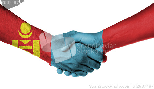 Image of Man and woman shaking hands