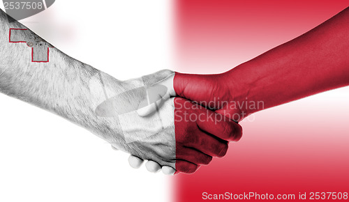 Image of Man and woman shaking hands