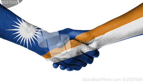 Image of Man and woman shaking hands