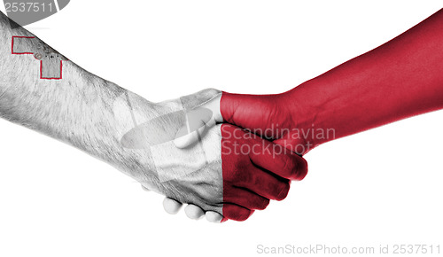 Image of Man and woman shaking hands