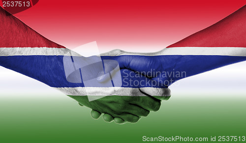 Image of Man and woman shaking hands