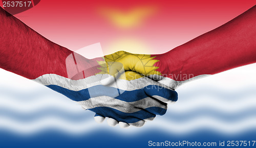 Image of Man and woman shaking hands