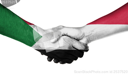 Image of Man and woman shaking hands