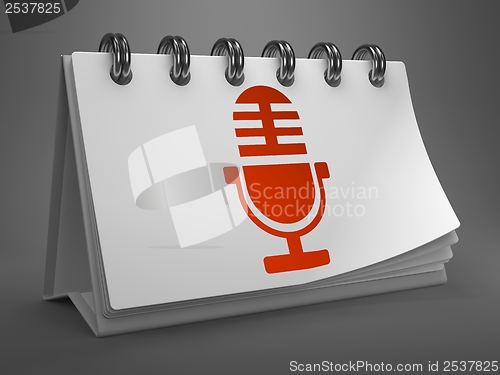 Image of Desktop Calendar with Microphone Icon.