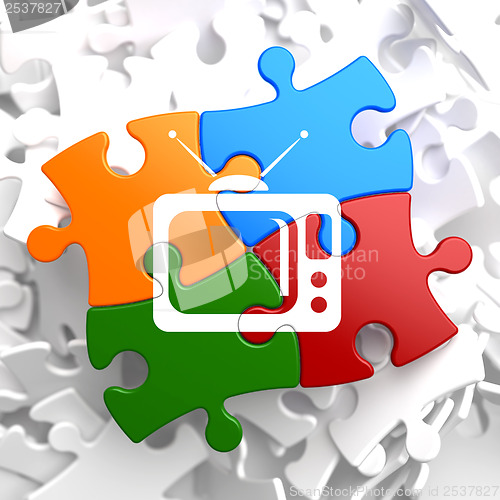 Image of TV Set Icon on Multicolor Puzzle.