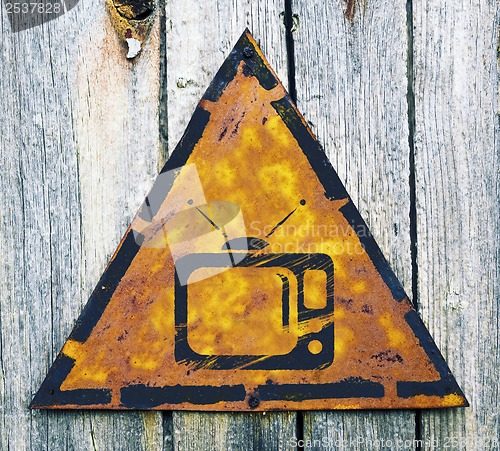 Image of TV Set Icon on Rusty Warning Sign.