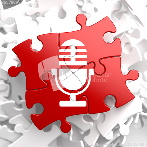 Image of Microphone Icon on Red Puzzle.