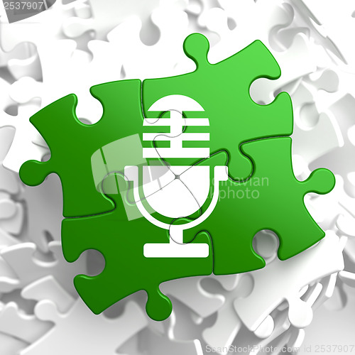 Image of Microphone Icon on Green Puzzle.