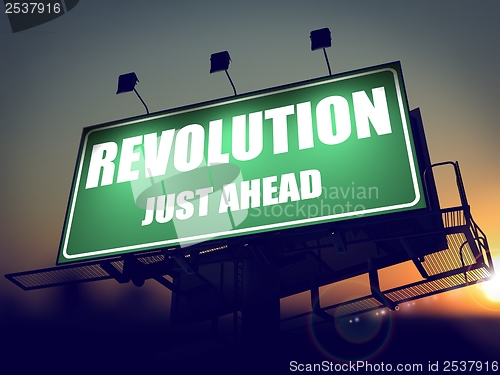 Image of Revolution Just Ahead on Billboard.