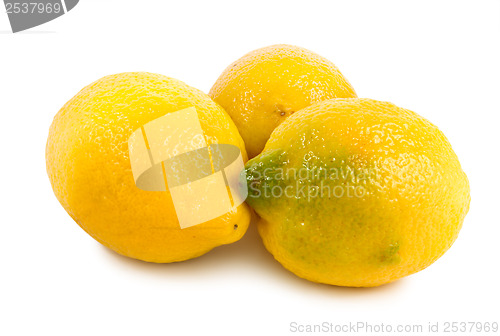 Image of Three lemons isolated on a white