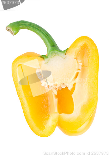 Image of Cutting the yellow pepper isolated