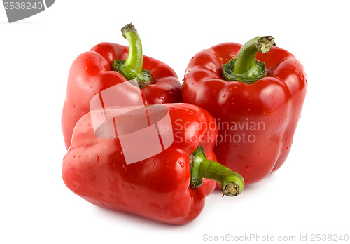 Image of Three red peppers