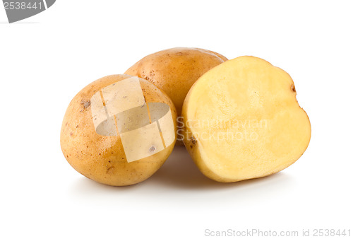 Image of Three raw potatoes