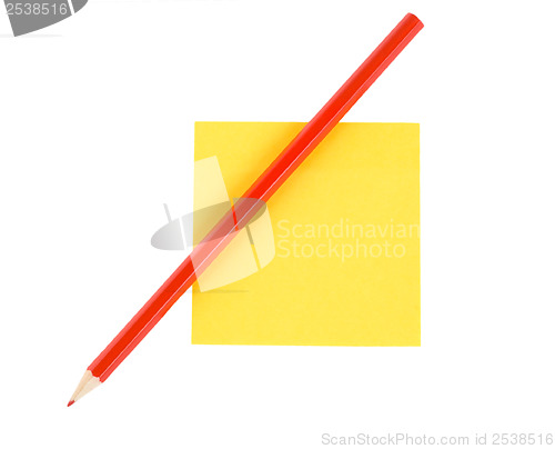Image of Red pencil on paper isolated