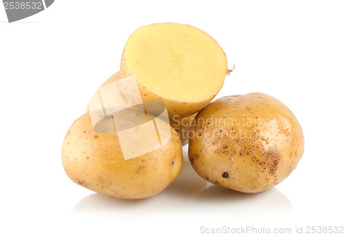 Image of Four potatoes isolated