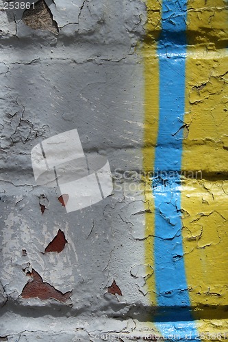 Image of Graffiti detail on a peeling painted wall