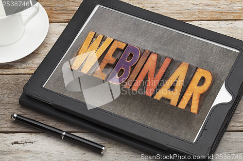 Image of webinar word on digital tablet