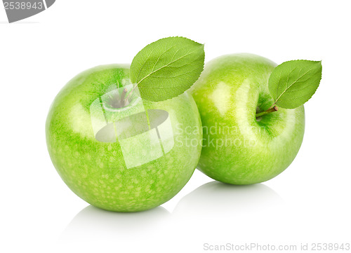 Image of Two green apples with leaves