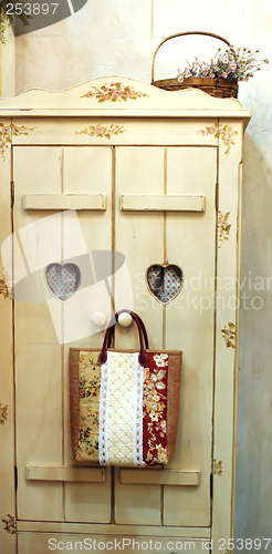 Image of Bag hanging on a closet