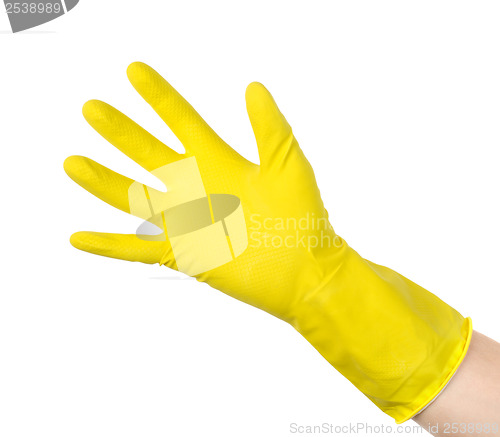Image of Yellow cleaning glove isolated