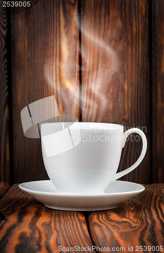 Image of White cup with steaming hot drink