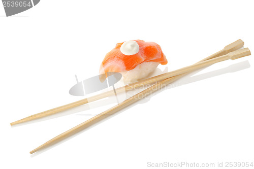 Image of Wooden chopsticks and sushi