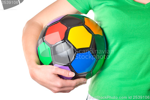 Image of Colored soccer ball in a girl's hand
