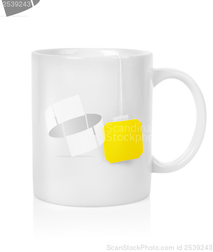Image of White cup with a teabag