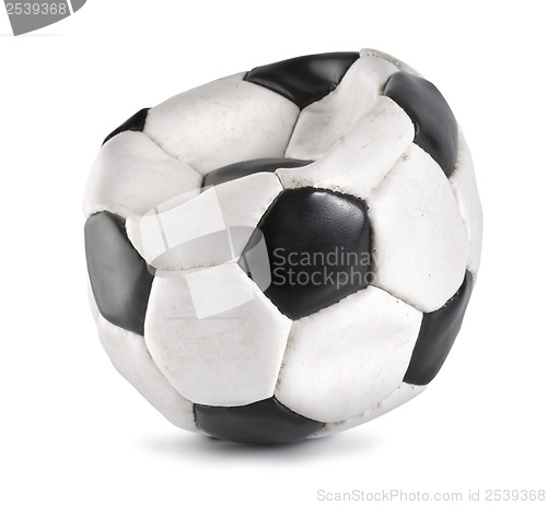 Image of Deflated soccer ball isolated