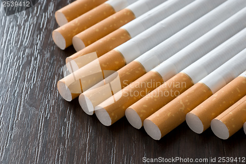 Image of Cigarettes on the black table