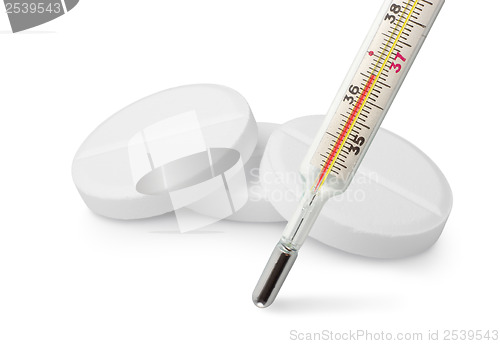 Image of Thermometer and tablets