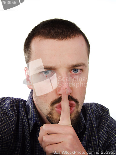 Image of Quiet! Silence! Young man gesture.