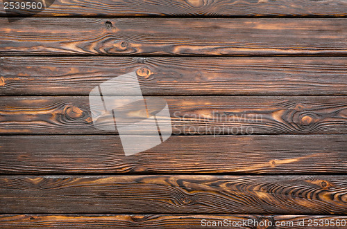 Image of Old dark wooden board 