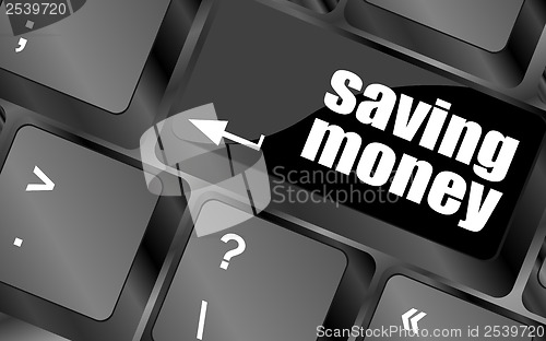 Image of saving money for investment with a button on computer keyboard