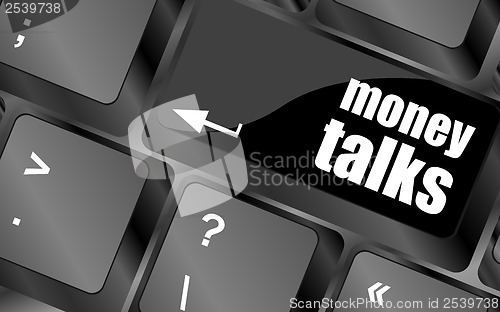 Image of money talks on computer keyboard key button
