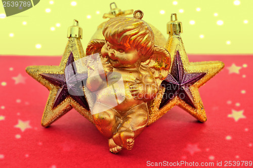 Image of cupid and golden xmas stars