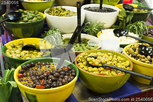 Image of Olives in bowls in a shop