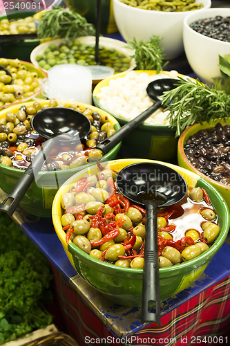 Image of Olives in bowls in a shop