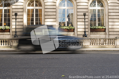 Image of Taxi in motion in London