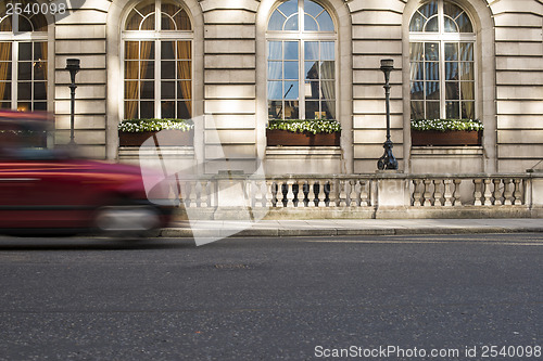 Image of Taxi in motion in London