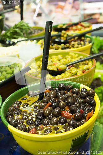 Image of Olives in bowls in a shop