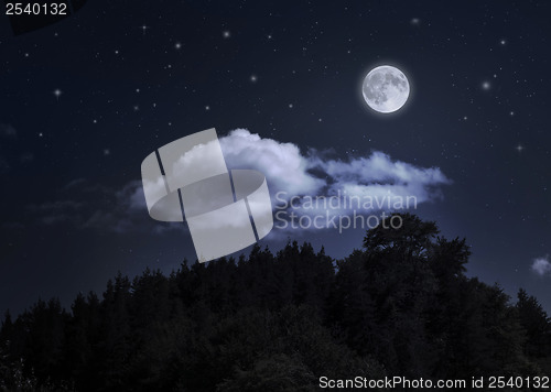 Image of Night starry sky and moon over the mountain