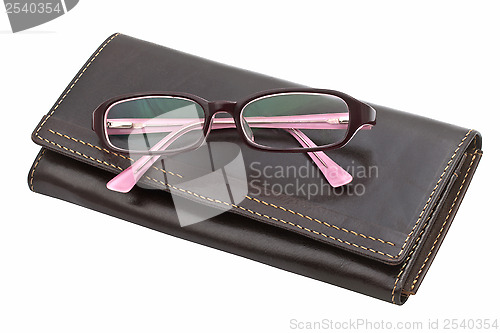 Image of notebook and glasses