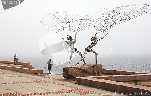 Image of PETROZAVODSK, RUSSIA ? JUNE 10: fishermen on the quay of Onega l