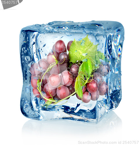 Image of Ice cube and blue grapes