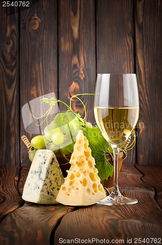 Image of Wineglass and cheese