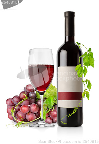Image of Bottle of red wine and grape