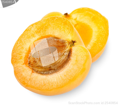 Image of Ripe apricot sectioned by knife