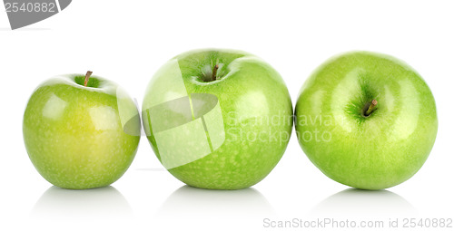 Image of Three green apples isolated