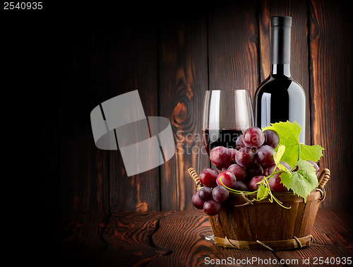 Image of Wine on the old wooden background